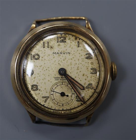 A gentlemans 9ct gold Marvin manual wind wrist watch, no strap.